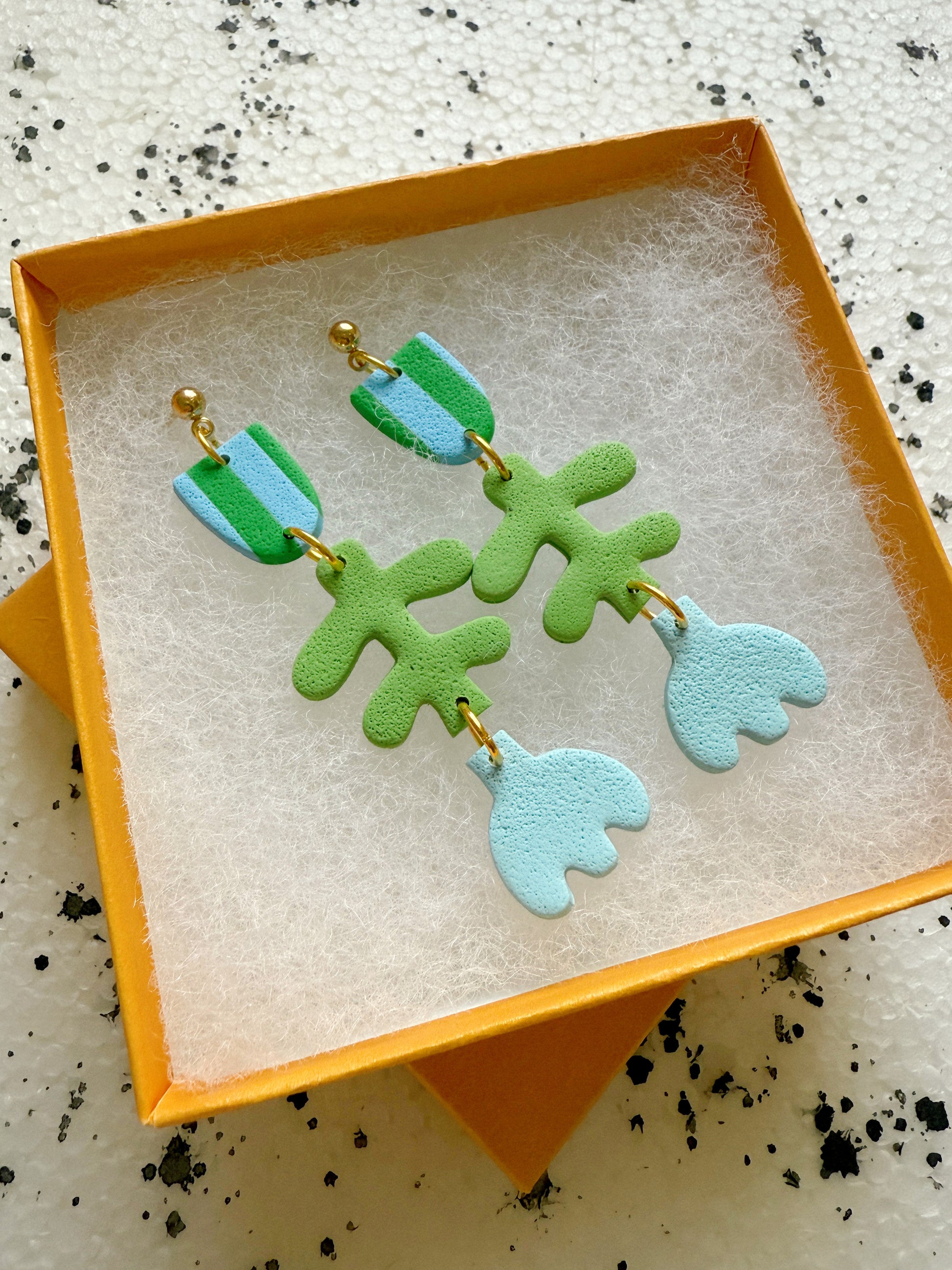 lola sky tulip earrings